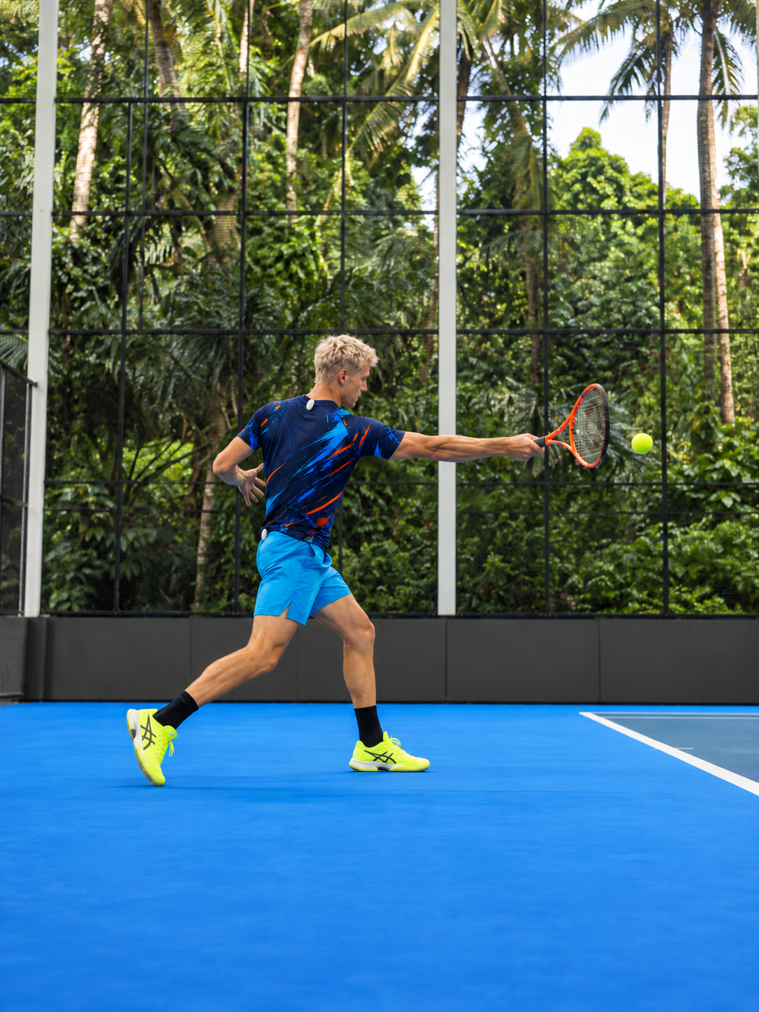 Tennis player on a blue court